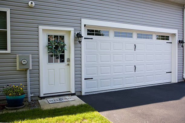 24/7 Emergency Garage Door Panel Replacement experts in West Columbia, TX